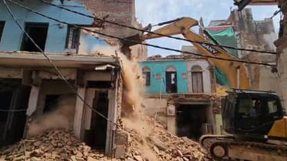Bulldozers raze 19 structures in Dalmandi road widening target set for completion by end of July in varanasi