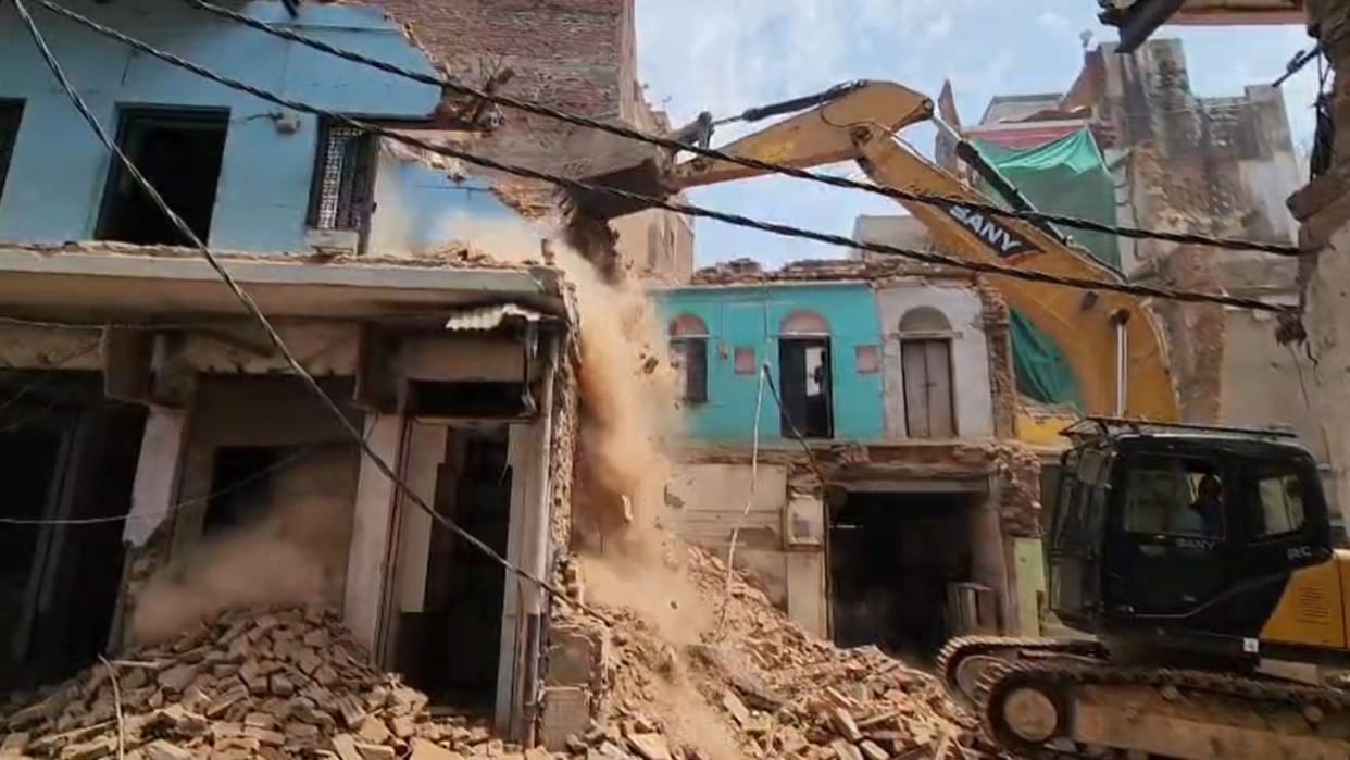 Bulldozers raze 19 structures in Dalmandi road widening target set for completion by end of July in varanasi