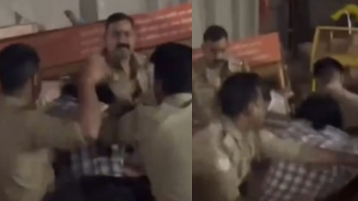 Video of police personnel beating a young man who had gone to visit the Bade Hanuman Temple goes viral