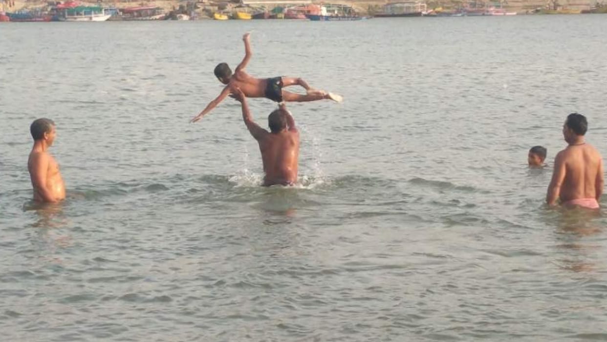 unique Gurukul tradition at Ganga Ghat in varanasi No fees or charges swim offer laddus Ganga river
