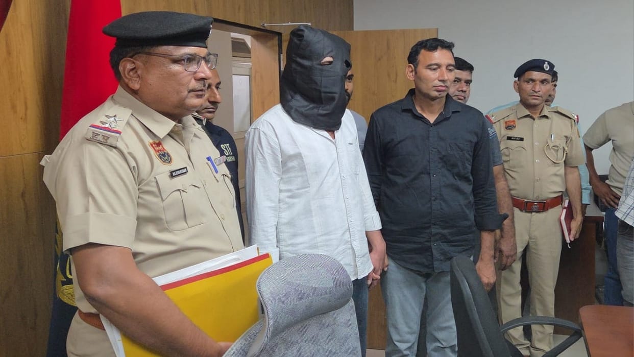 hisar Police deported Dinesh Khairampuria accused in the Mahindra showroom firing case in Hisar, from Cyprus.