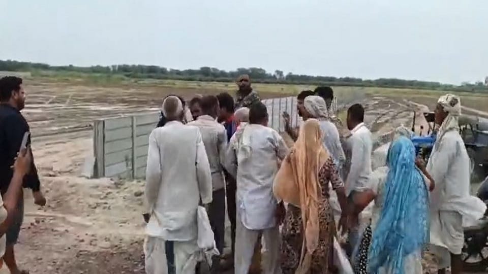 Two youths poured petrol on themselves over land dispute