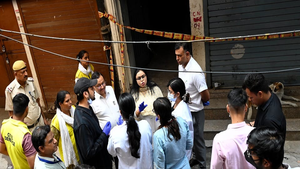 Tughlakabad fire incident Conspiracy hatched over money dispute three arrested