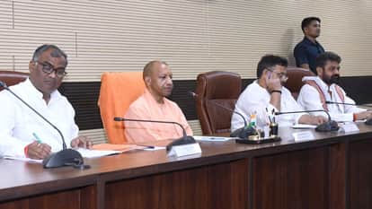 CM Yogi message No laxity in road projects all work completed before rains review held in varanasi