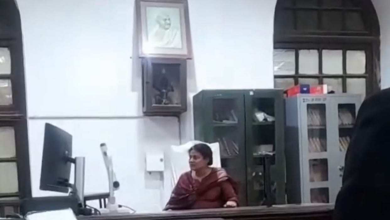 woman sat in judge chair at Varanasi District Court and issued an order police took her into custody