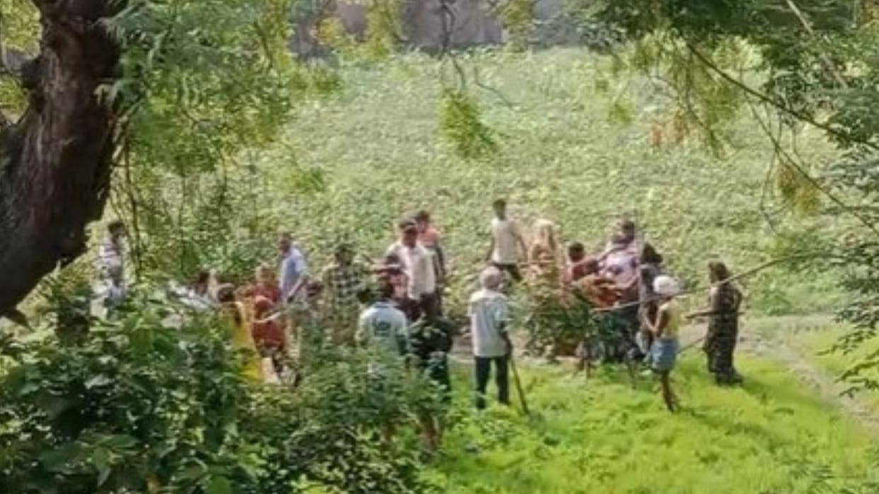 Chandauli News Village head chased and beaten in field following dispute over collision involving Bolero