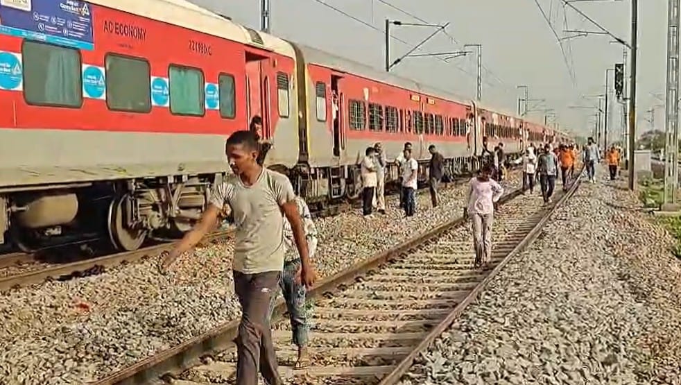 Father Watches Helplessly as Wife and Son Die in Train Tragedy Triggered by Fire Rumour