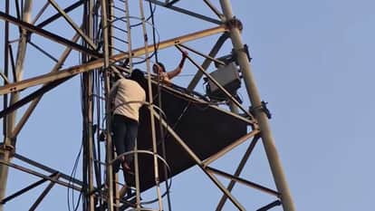 Married woman in Gopalganj climbs mobile tower distressed by husband's illicit affair