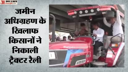 gujarat farmers tractor rally land acquisition power poles kisan adhikar yatra