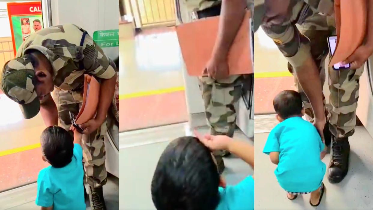 Little Child salut CISF jawan upon seeing his uniform in the Delhi Metro and then touched his feet