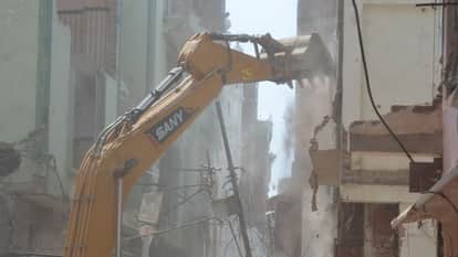 Dalmandi, Varanasi Five buildings demolished Dalmandi using Poclain machine demolition drive began 7 AM