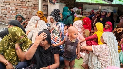 Father Watches Helplessly as Wife and Son Die in Train Tragedy Triggered by Fire Rumour