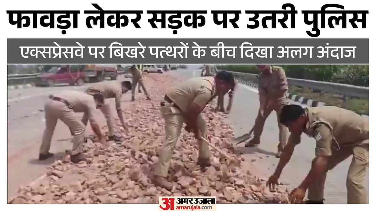 Gravel fell from truck on Peripheral Expressway police clearing road with shovels