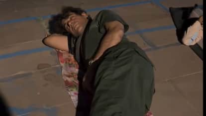 Actor comedian Sunil Grover sleeps on the road near a riverbank amidst many devotees