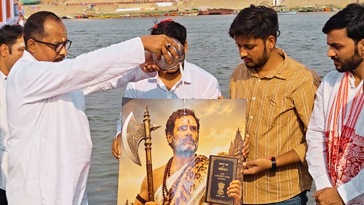 Milk offered photograph of Rahul Gandhi holding gadasa and Constitution of india workers performed Ganga Puja