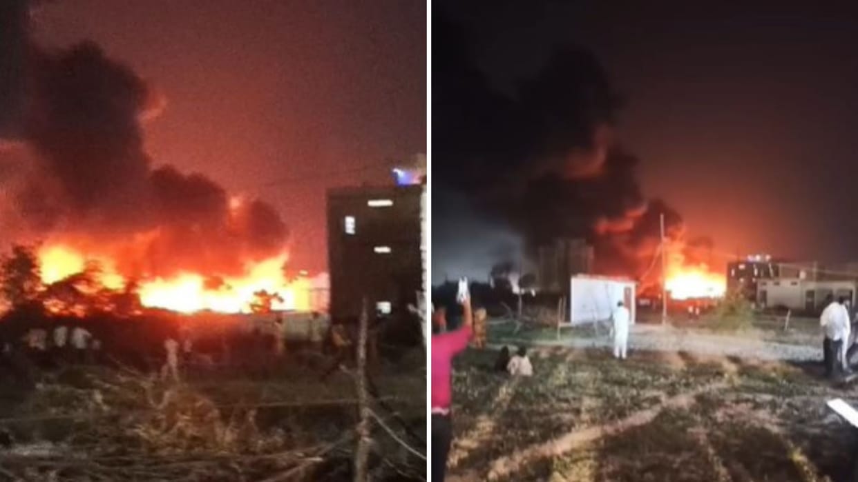 Varanasi Massive fire CNG pump 40 foot high flames spark panic videos and photos captured from 300 meters away