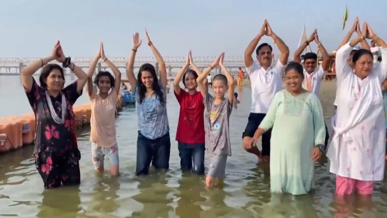 Swimmers conveyed the message of a healthy life by performing 'Jal Yoga' (yoga in water) in the Yamuna River.