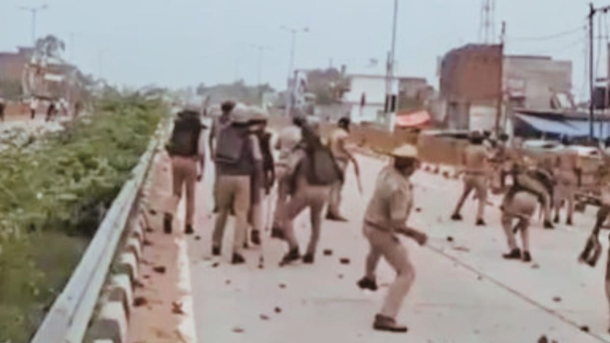 Woman killed vehicle while crossing four-lane highway stone-pelting between villagers and police