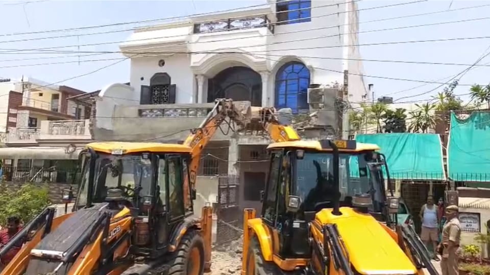 Bulldozer Rolls In, History-Sheeter’s House Demolished, Women Protest in Central Market