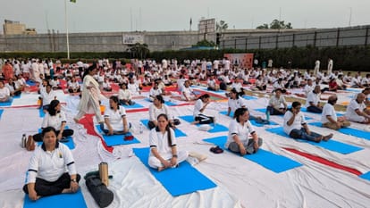 Leaders and ministers in Delhi, including LG Sandhu, performed yoga and listened to PM Modi's address.
