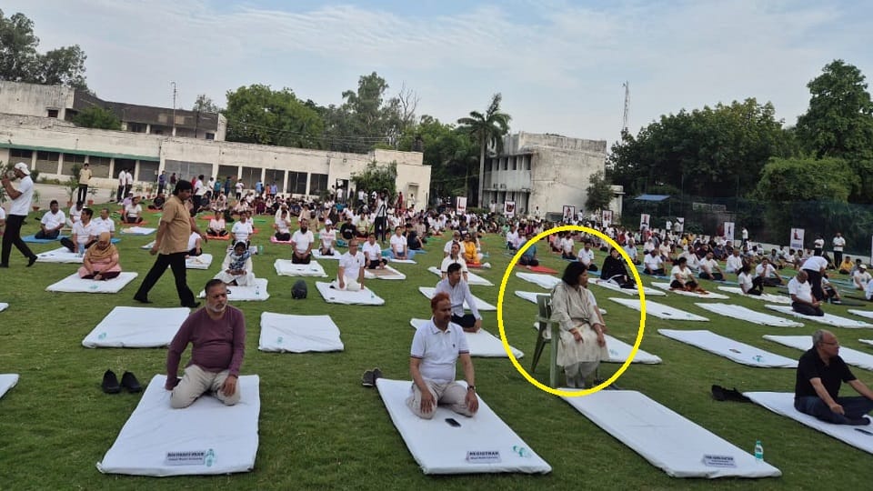 Mass yoga practice at AMU