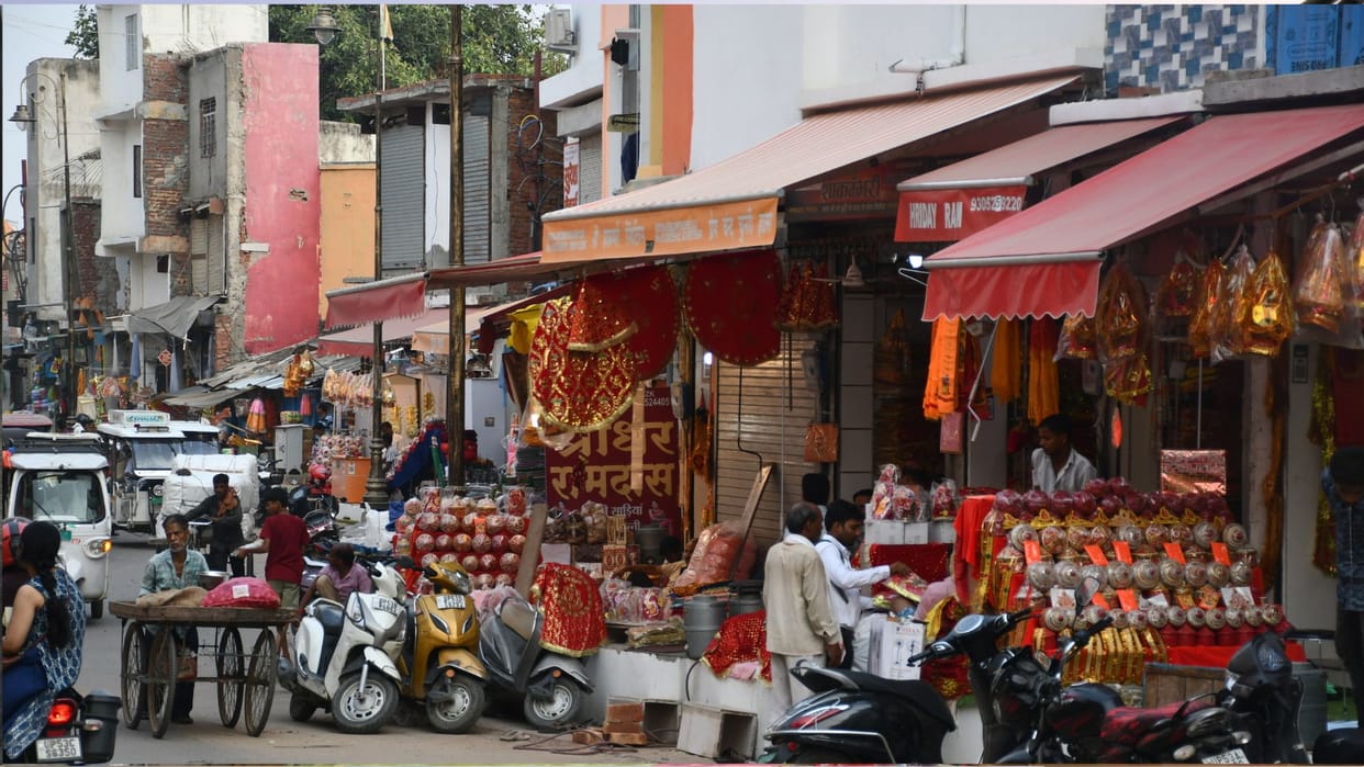 Forget the footpaths; in many places, shopkeepers have encroached even onto the road.