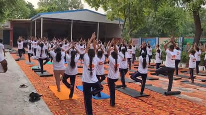 Leaders and ministers in Delhi, including LG Sandhu, performed yoga and listened to PM Modi's address.