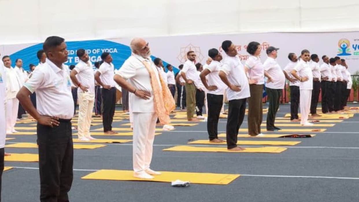 PM Modi performed yoga in Kolkata while Defence Minister did in Meghalaya images poured across country