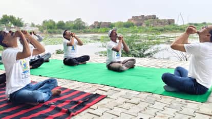 Yoga Day 2026: CM performs yoga at the foothills of Jhansi Fort; camps organized across the district.