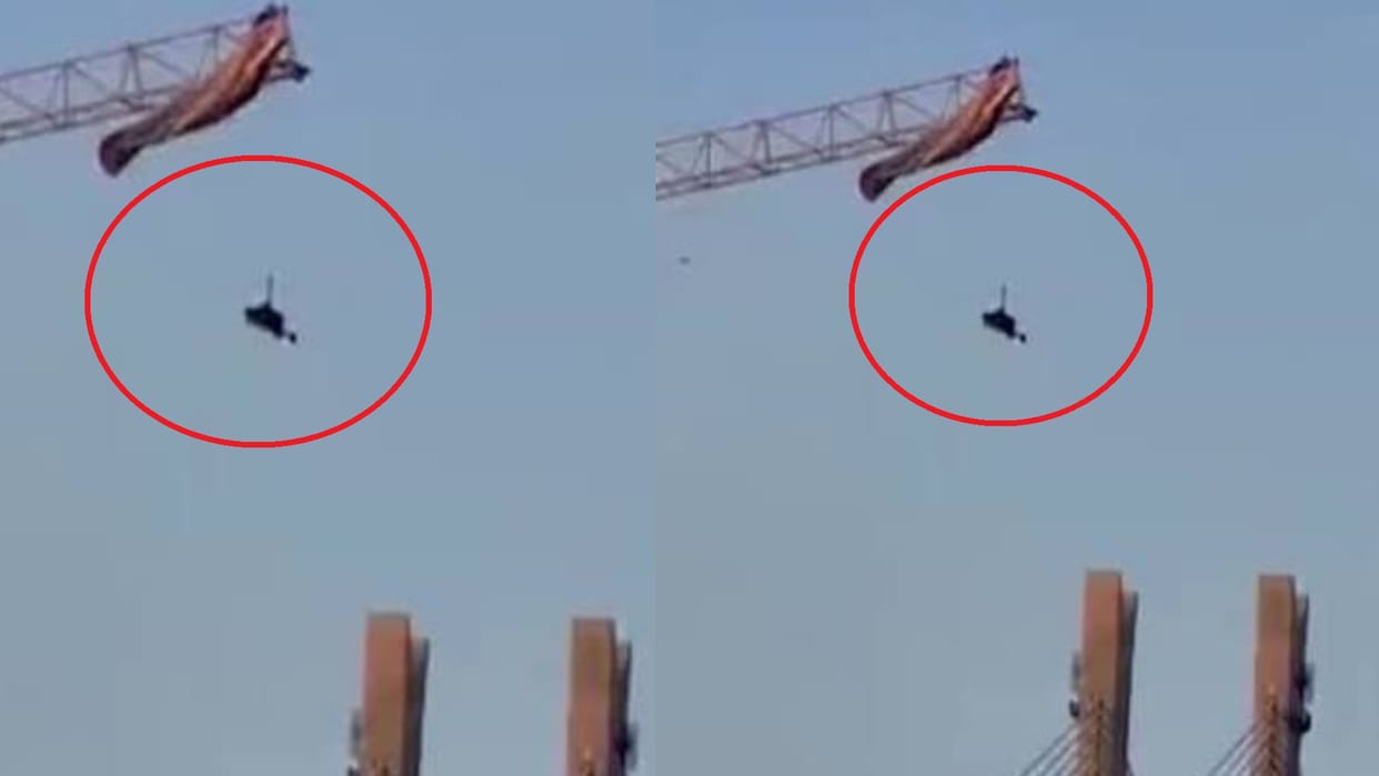 China Paragliding Accident man stuck on crane 200 feet rescue operation video viral on internet