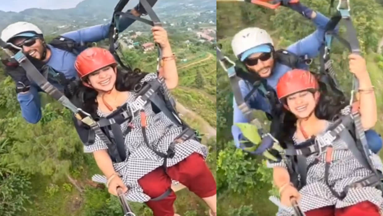 Paragliding pilot gifts leaves to female passenger mid flight video goes viral