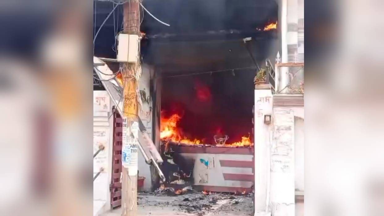 Massive fire breaks out at a stationery shop in Lukerganj; four people, including two children, rescued.