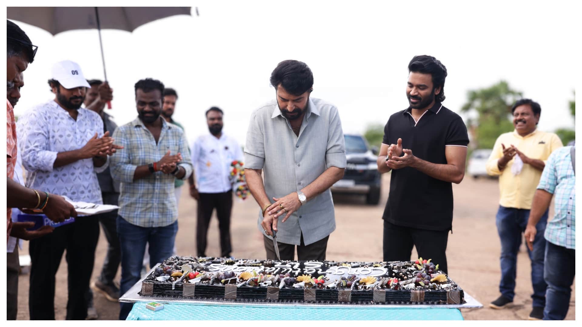 Dhanush congratulates Mammootty on Padma Bhushan with a cake-cutting celebration