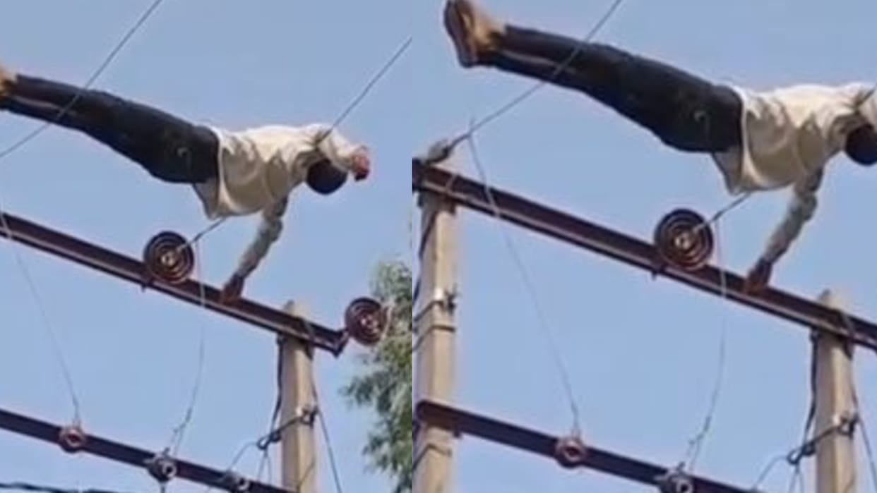 viral video maharajganj drunk man climbs 11kv pole in maharajganj rescued