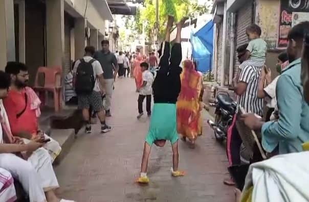 boy fulfilled his grandmother last wish by performing Barsana Parikrama walking on hands