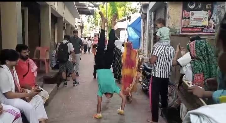 boy fulfilled his grandmother last wish by performing Barsana Parikrama walking on hands