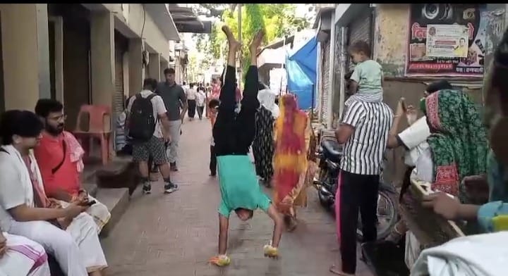 boy fulfilled his grandmother last wish by performing Barsana Parikrama walking on hands
