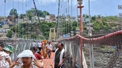 MP News Omkareshwar Jhula Bridge Reopens for Devotees Two Days After Repair Work