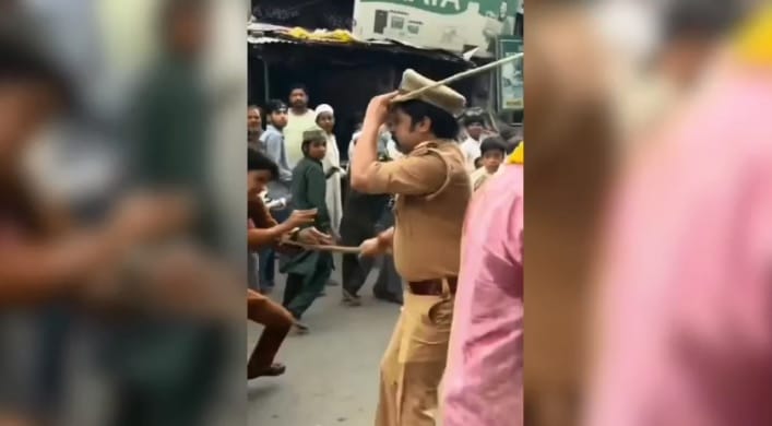 Kanpur SI uses lathi during Muharram procession 32 second clip goes viral raising questions about police