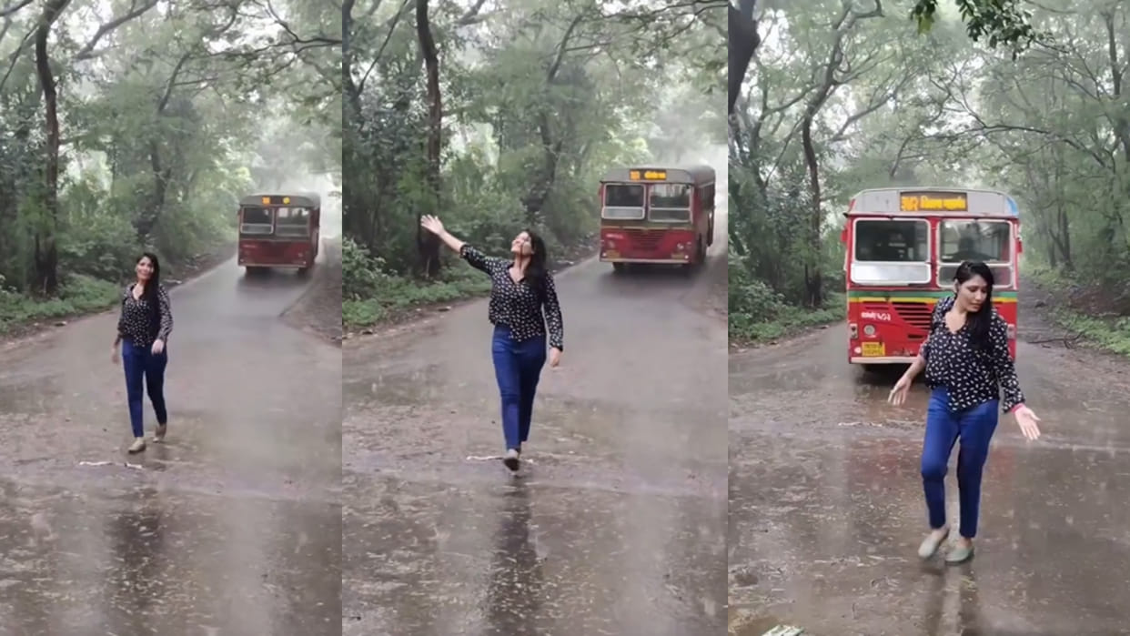 Girl dance reel in rain middle of the road when speeding bus approached from behind video goes viral