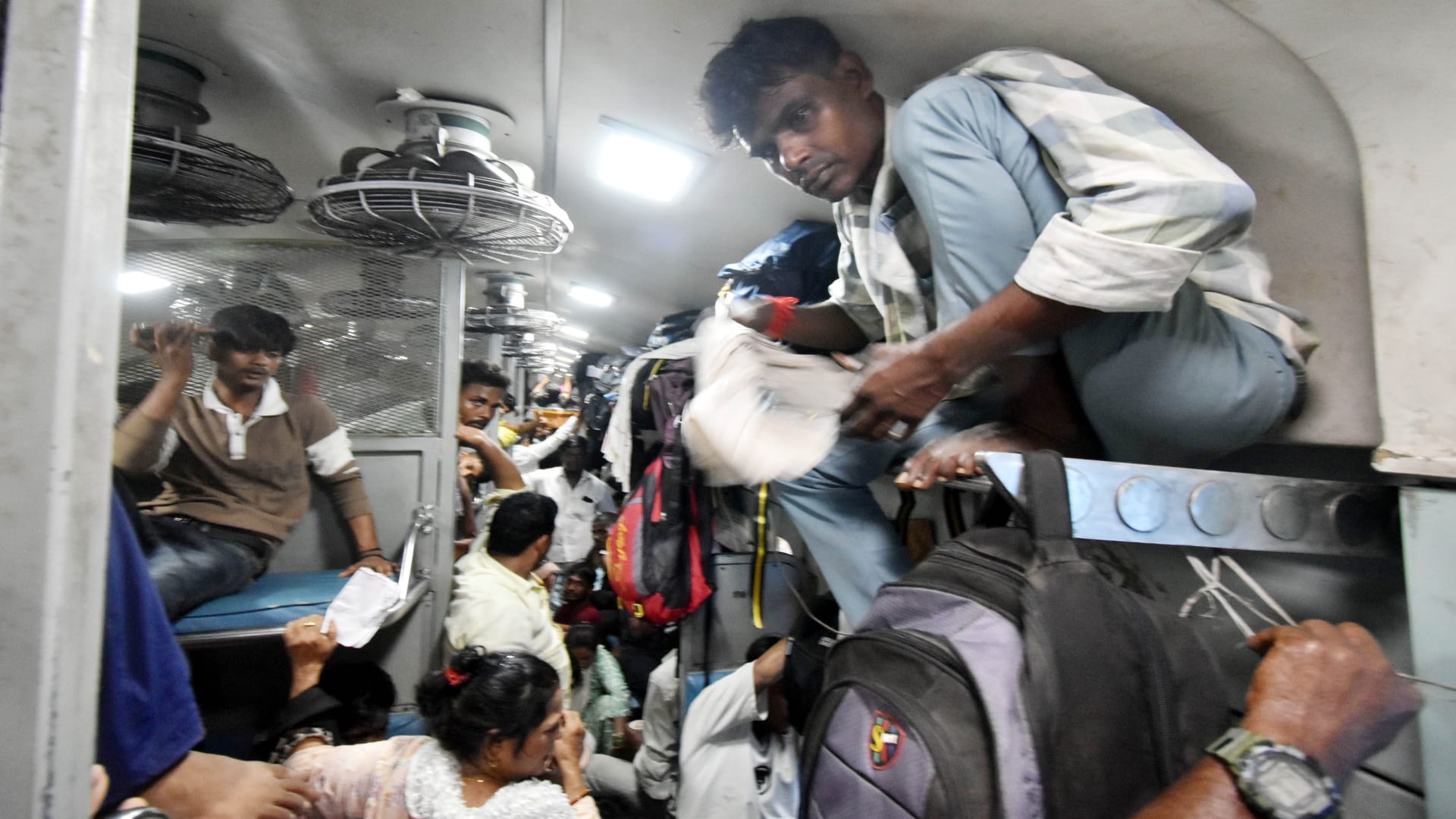 TET Exam: Surge of examinees in trains and buses; candidates climbed into coaches through windows.