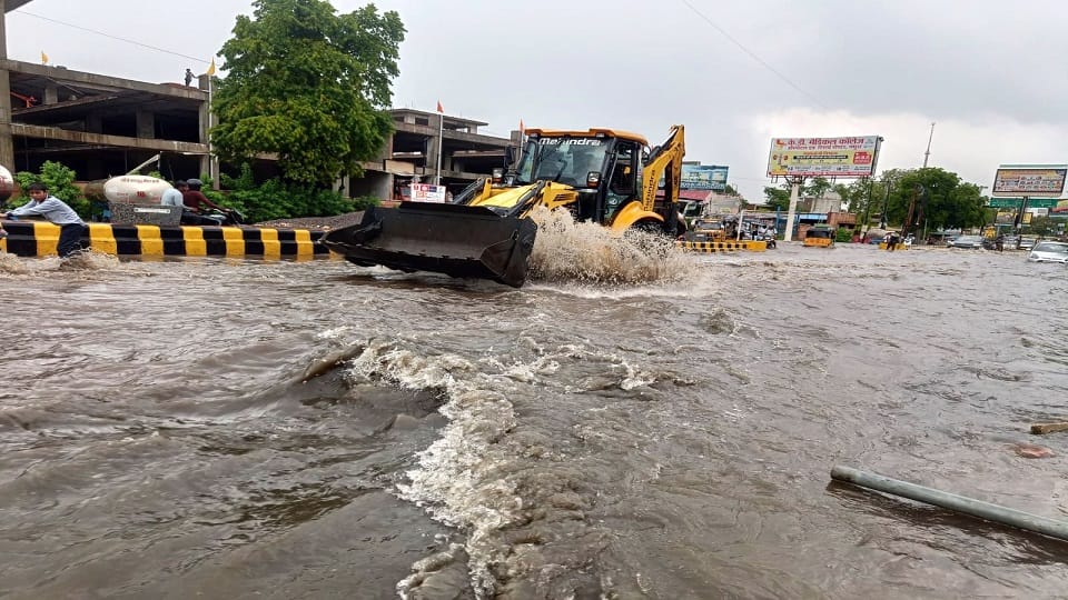 Half-Hour Rain Floods Mathura: Underpasses Submerged Commuters Risk Lives Crossing Railway Tracks