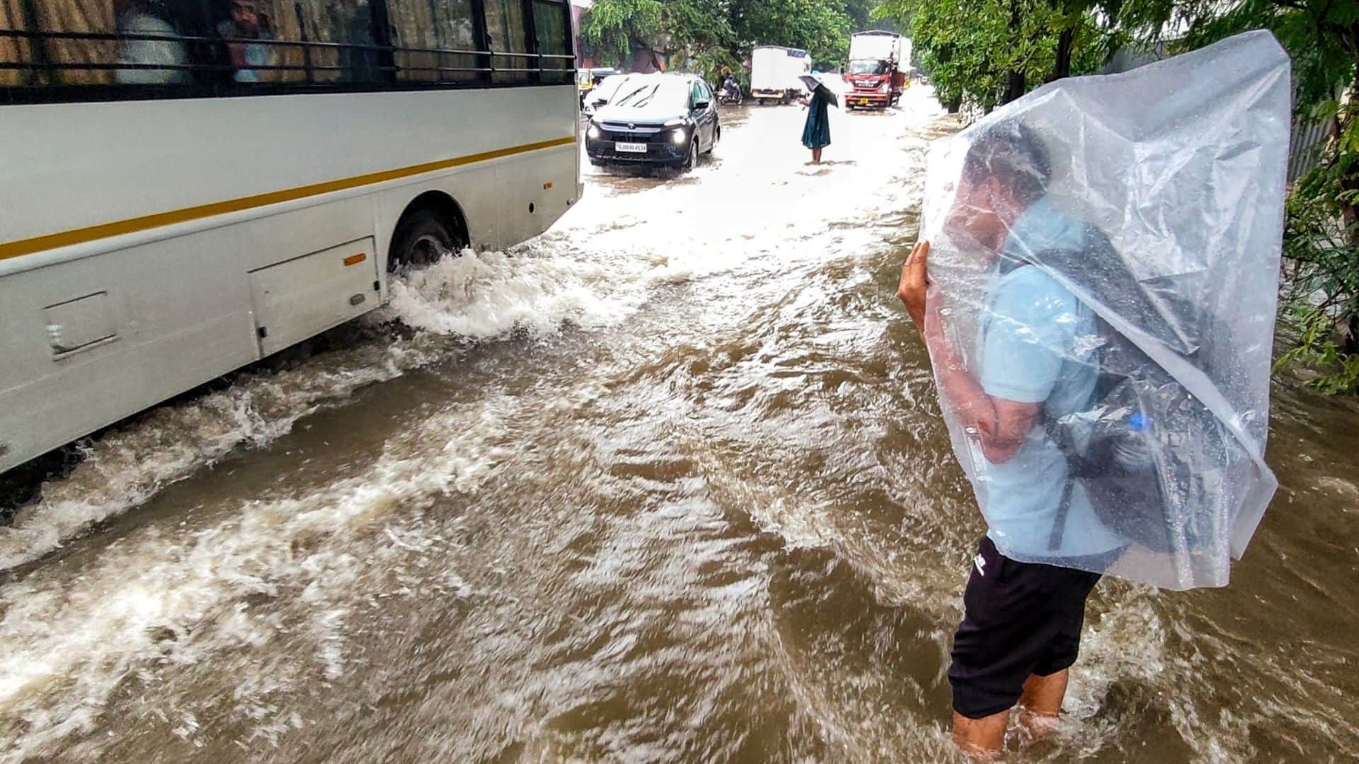 Mumbai weather update Facing Heavy rain IMD Issues Red Alert Strong Winds High Tide