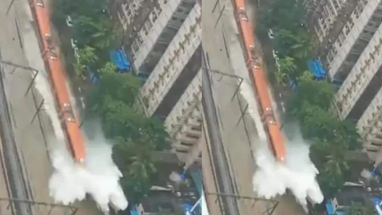 mumbai rain water on railway tracks vande bharat cross high speed shocking video viral