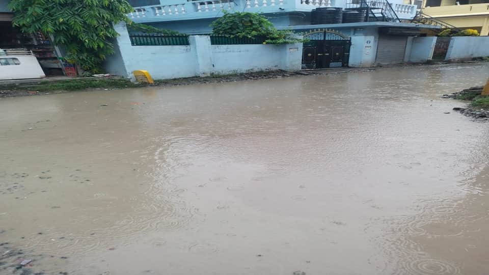 Drains blocked and water flowing on the road in haldwani after rain