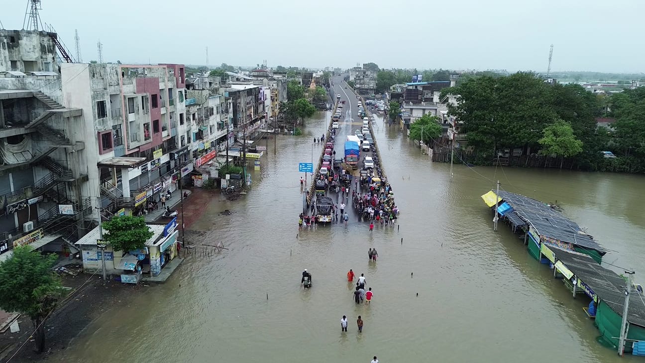 IMD Bad Weather Photos Mumbai Surat Delhi-NCR Rain Road Waterlogging monsoon expose local body wrath picture