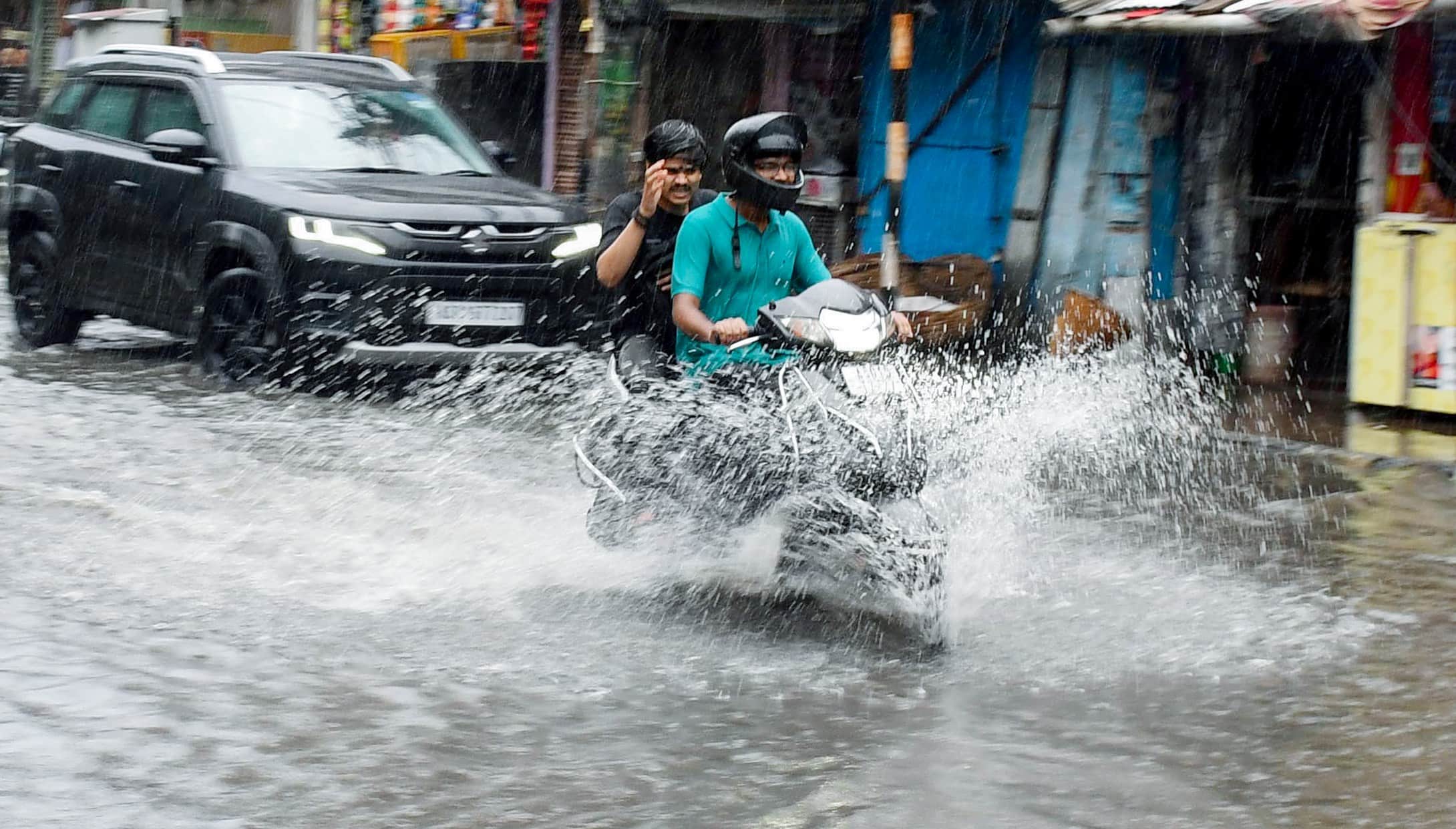IMD Bad Weather Photos Mumbai Surat Delhi-NCR Rain Road Waterlogging monsoon expose local body wrath picture