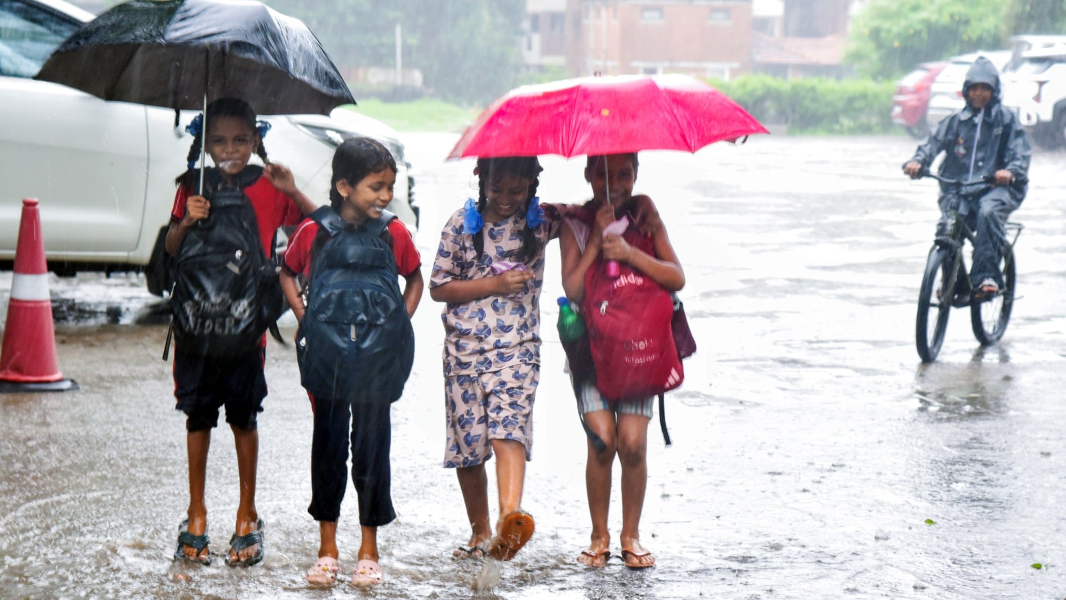 IMD Bad Weather Photos Mumbai Surat Delhi-NCR Rain Road Waterlogging monsoon expose local body wrath picture