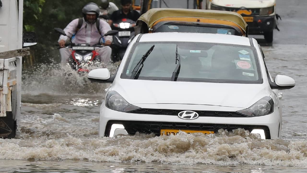 Rain in Delhi NCR Temperature drops by 7 to 8 degrees IMD issues yellow alert