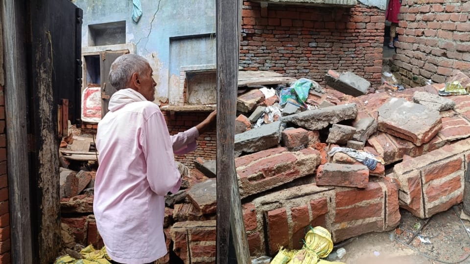 House's sunshade collapses due to rain; father and son injured